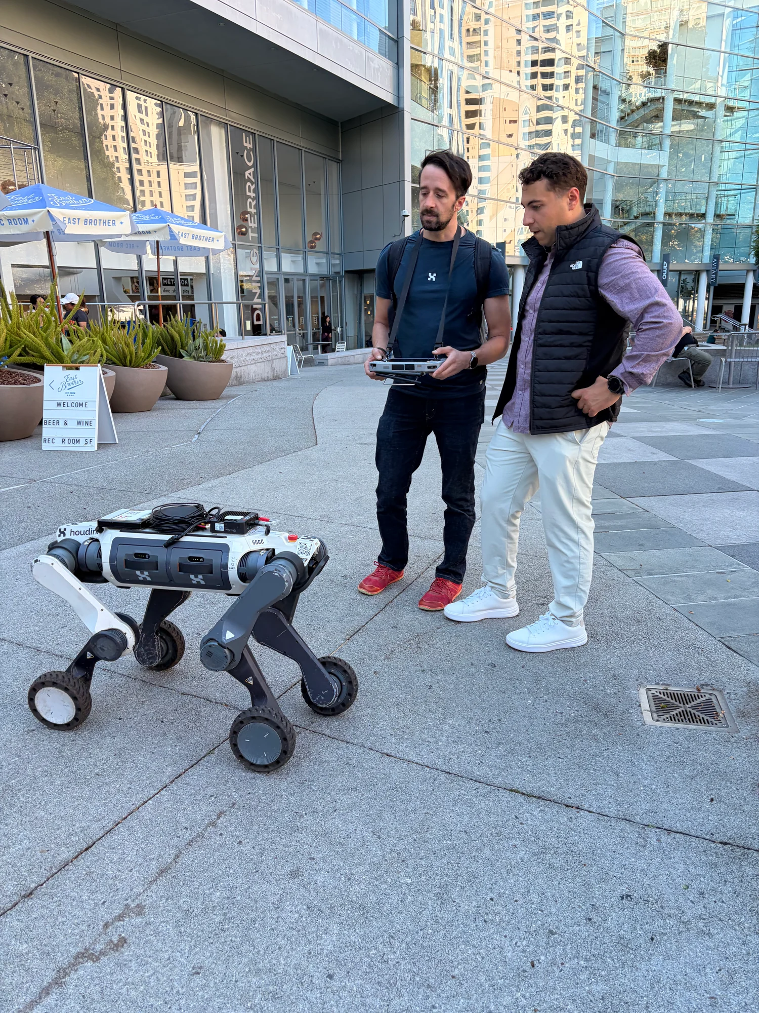 Jakeob and another person exploring a wheeled robot